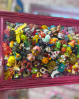 Muck N Brass art Toys R Art No 137 in a Pink Frame