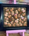 Muck N Brass Posters, Prints, & Visual Artwork Toys R Art Doll Faces in a navy frame